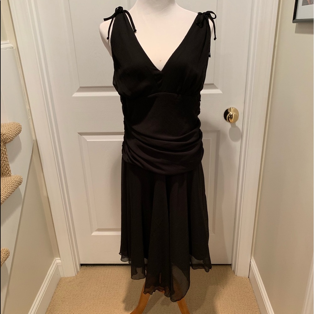Black cocktail dress, flattering ruching.Worn once